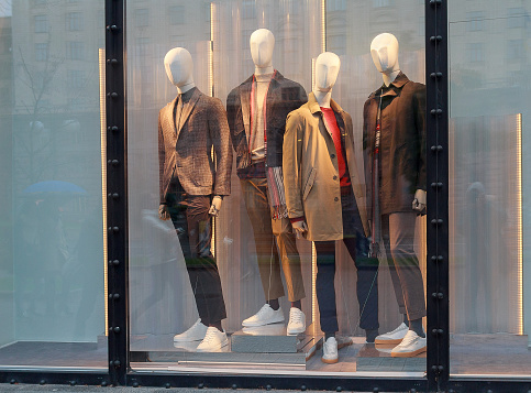 Men's mannequins in the window of a luxury store