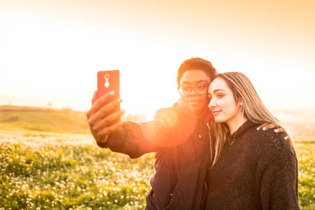 istock Best friends taking selfie in nature 670910724