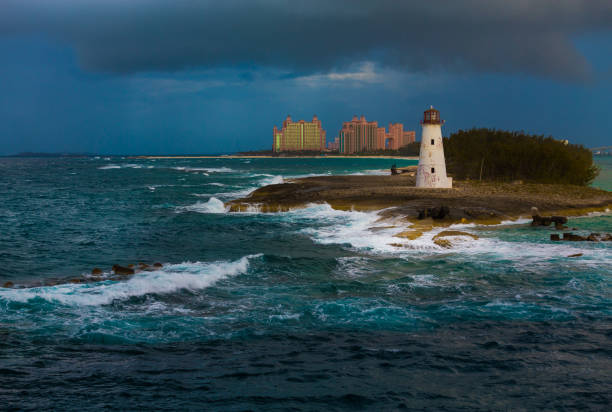 One stormy day in New Providence (Nassau), Bahamas. Cruise ship docked in the pier. In far distance Atlantis resort.