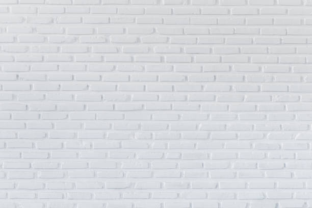 istock Pattern of white brick wall for background and textured 670915040