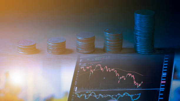 double exposure of rows of coins and account book in finance and banking concept - stock market china shenzhen asia imagens e fotografias de stock