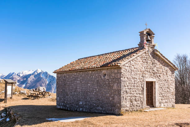 istock Chapel on Monte San Simeone in the background Monte Chiampon 670919688