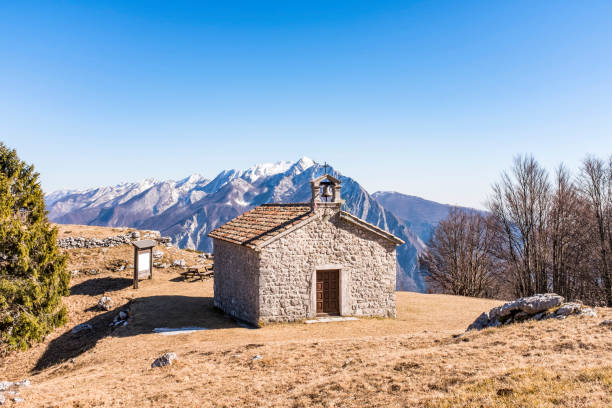 istock Chapel on Monte San Simeone in the background Monte Chiampon 670919698