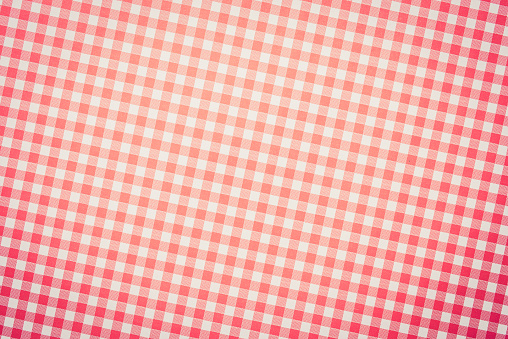 Checkered paper background. Close up