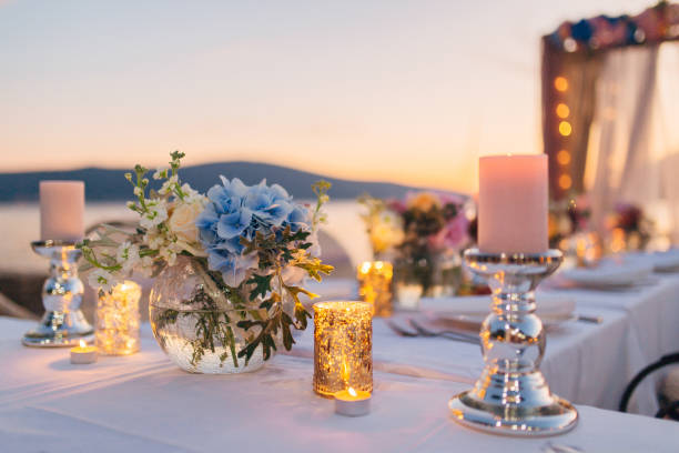 istock Candles on the wedding table at a banquet 670924564