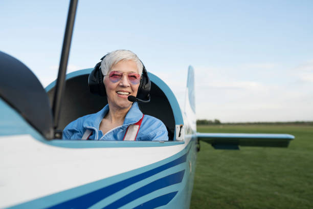 Beautiful day for flying Woman pilot, preparing for flying pilot photos stock pictures, royalty-free photos & images