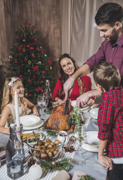 istock Family having Christmas dinner 670925872