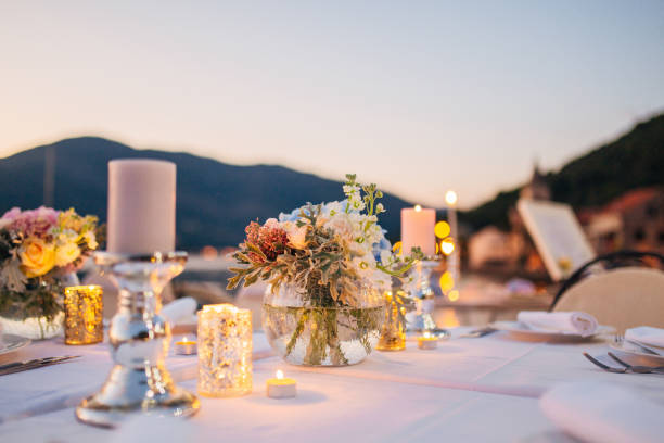 istock Candles on the wedding table at a banquet 670930174