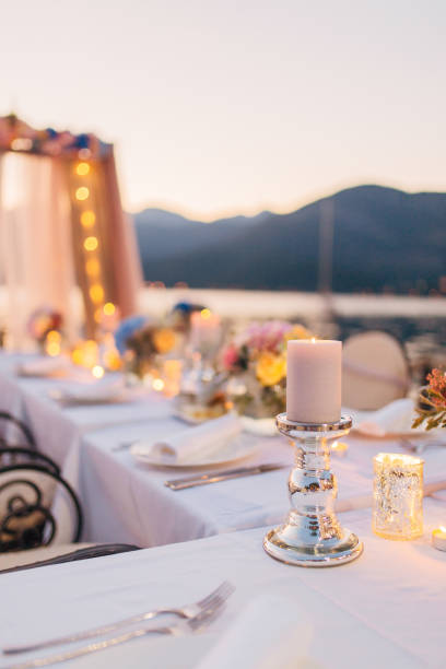 istock Candles on the wedding table at a banquet 670930290