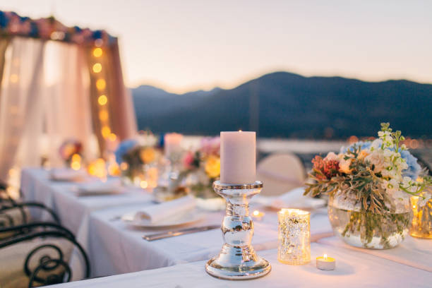 istock Candles on the wedding table at a banquet 670930974