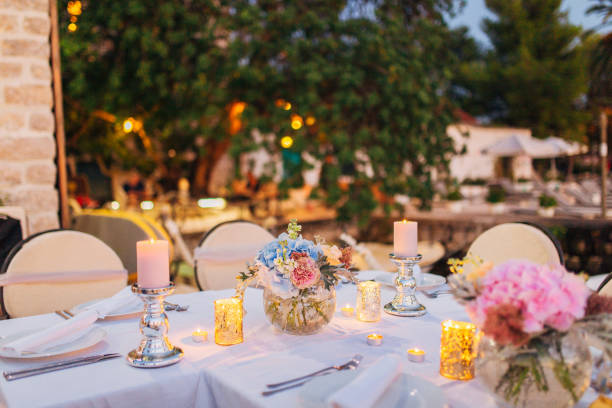 istock Candles on the wedding table at a banquet 670933756