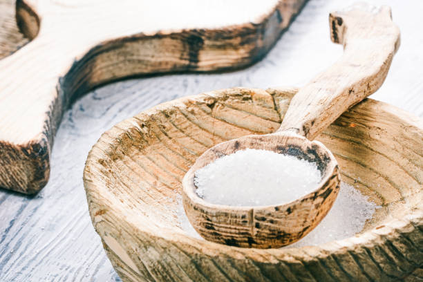 istock Sugar in wooden bowl 670940990