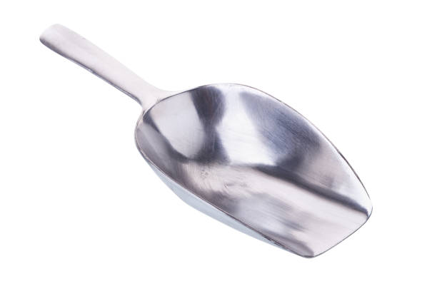 istock metal scoop with flour isolated on a white background 670941336