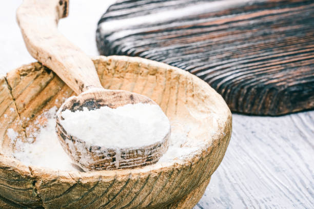 istock Flour in wooden bowl 670941572