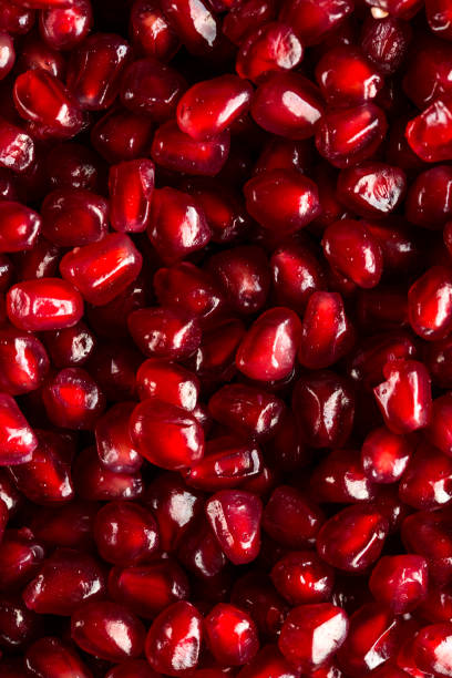 istock Juicy pomegranate seeds close up 670941826