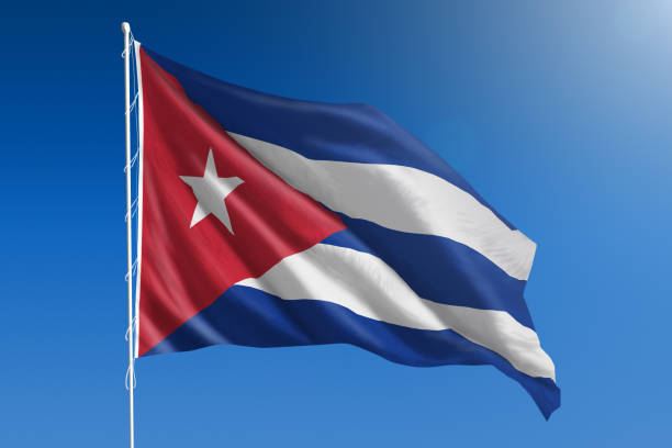 istock National flag of Cuba on clear blue sky 670951384