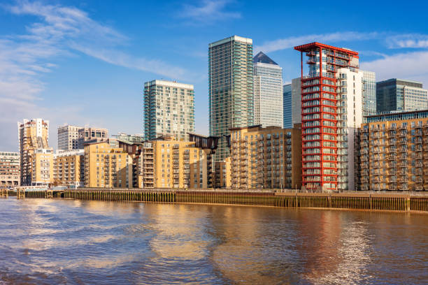 New Apartments in London England UK Stock photograph of new waterfront apartment buildings, condos in the Canary Wharf Area of London, England, United Kingdom. london docklands stock pictures, royalty-free photos & images