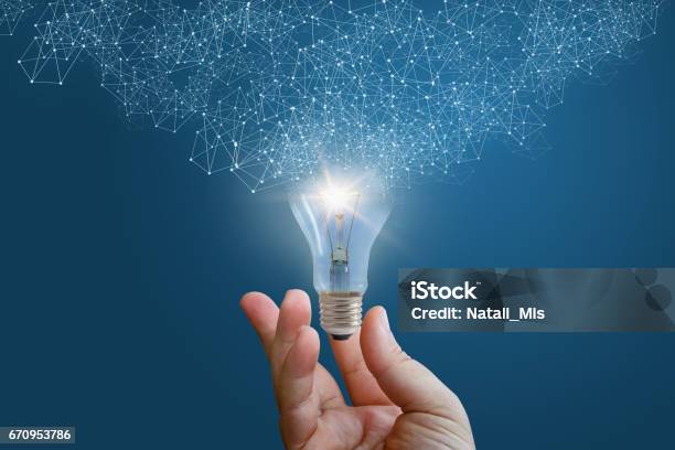 Innovative Idea In Businessman Hand Stock Photo - Download Image Now - Innovation, Light Bulb, Concepts