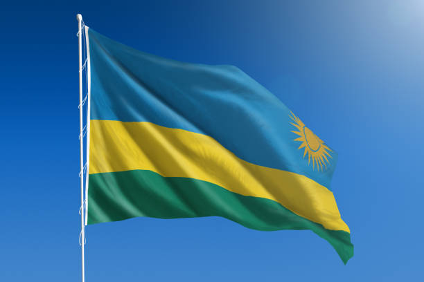 istock National flag of Rwanda on clear blue sky 670954346