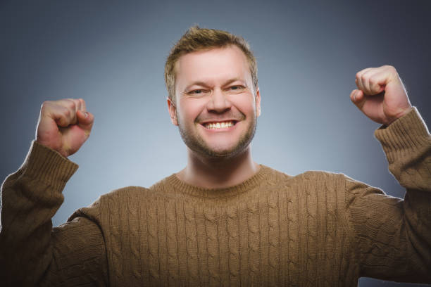 istock Closeup portrait successful happy man isolated grey background. 670956874
