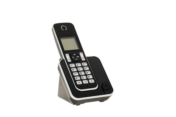 istock modern cordless landline dect phone with charging station isolated on white with clipping path. Design element 670964390