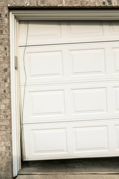 istock Garage Door Broken, Not Operational at Residential Home 670970510