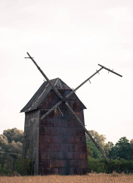 istock Kawnice, Poland. Old ruined windmill on the field. 670974968