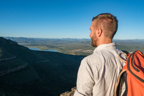 istock Contemplation at top of mountain 670975582