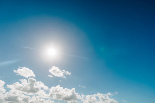 istock Bright blue sky with Autumn sunshine and lens flare. 670978920