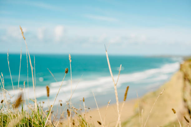 istock Views over the Bright Sunny Cornish Coast at Newquay, Cornwall. 670978954