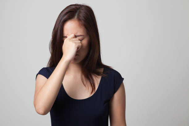 istock Young Asian woman got sick and  headache. 670987854