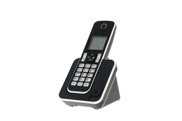 teléfono dect de moderno teléfono fijo inalámbrico con cargador aislado en blanco - cordless phone telephone landline phone telephone receiver fotografías e imágenes de stock