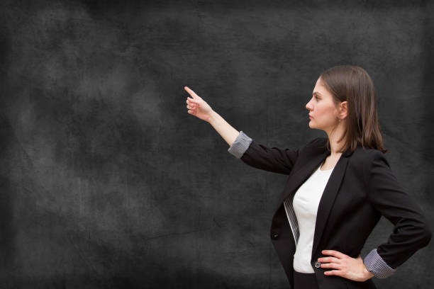 istock Young business woman showing copy space 670990852