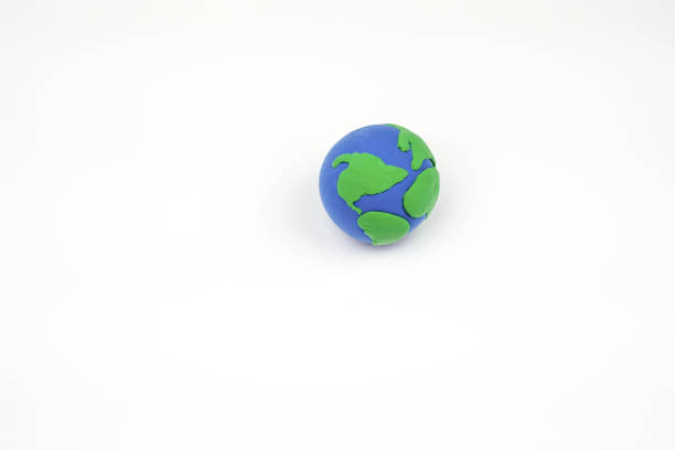 istock Globe ,earth made from clay on white background. Concept Save green planet. Earth day holiday concept 670991292