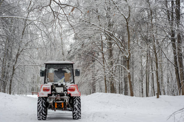 istock Tractor on Snowy alley 670999002