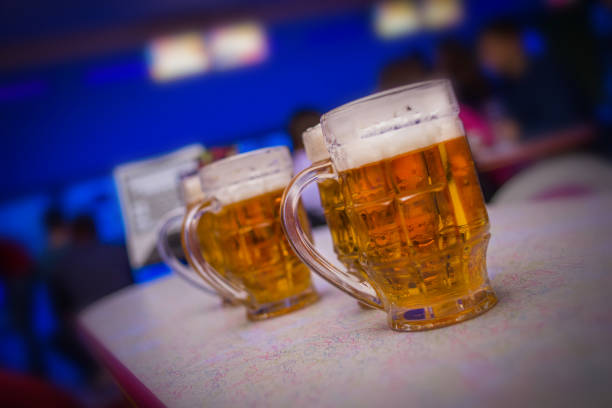 istock Pint of beer at the night bar 671005224