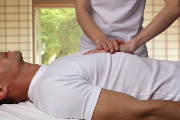 istock Man having reiki healing treatment , alternative medicine concept. 671014254