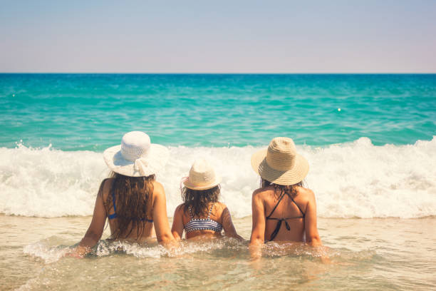 istock Family Relaxing At The Beach 671015464