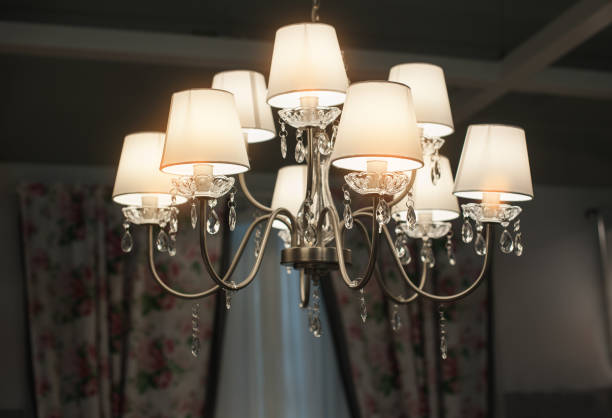 istock Beautiful luxurious chandelier in the hall 671018026