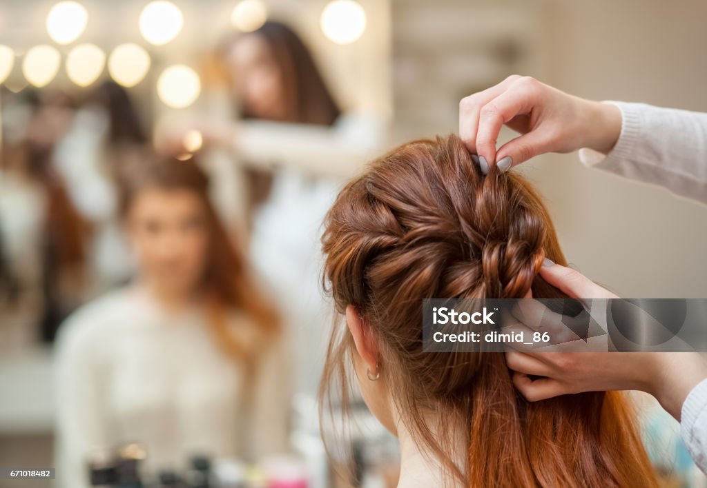Beautiful Redhaired Girl With Long Hair Hairdresser Weaves A French Braid  In A Beauty Salon Stock Photo - Download Image Now - iStock