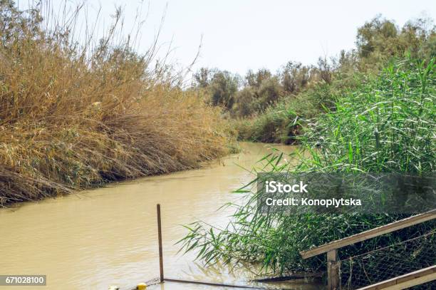 Jordan River On A Hot Afternoon Jordanisrael Border Stock Photo - Download Image Now
