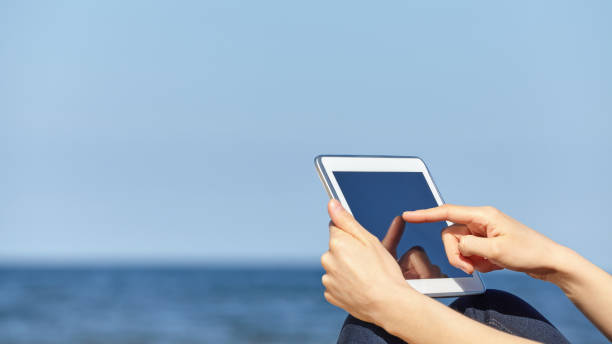 istock Close up picture of finger touching screen of tablet computer. 671028538