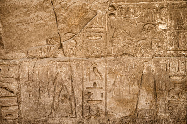 istock Hieroglyphic of pharaoh civilization in Karnak temple, Egypt 671034666