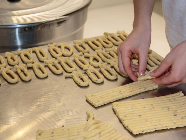 istock Yellow Italian Taralli Preparation: Traditional Snack 671035596