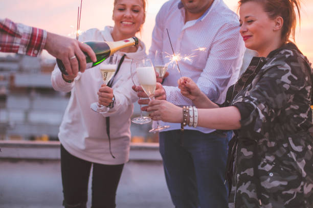 istock Sparkling wine and sparkler lights 671035852
