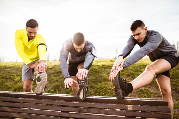 istock group of friends stretching together 671047910