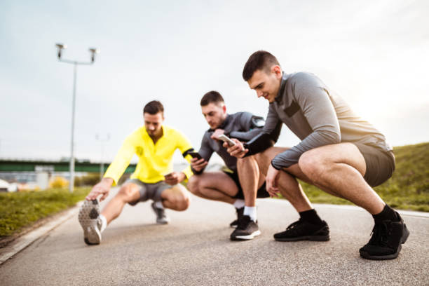 istock group of friends stretching together 671048102