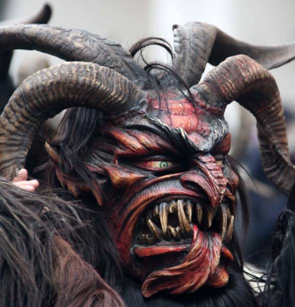 istock Monster mask during Santa Klaus parad 671050616