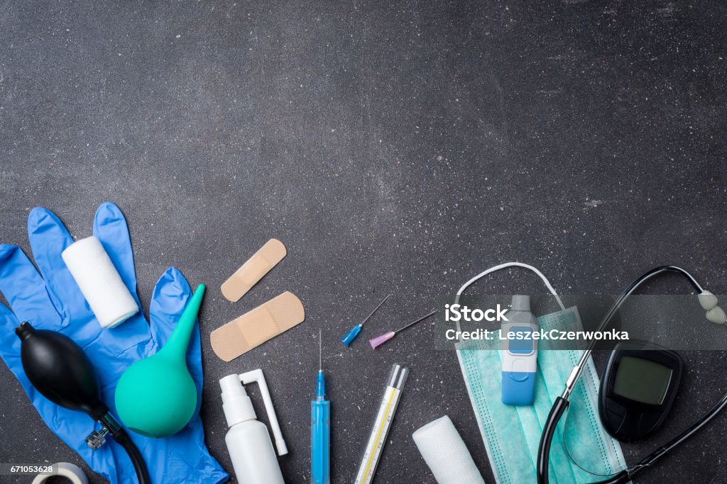 Overhead shot of medical equipment on dark stone background Overhead shot of medical equipment on dark stone background. Close up Backgrounds Stock Photo