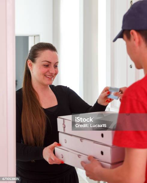 Payment Of The Pizza Stock Photo - Download Image Now - ATM, Adult, Adults Only